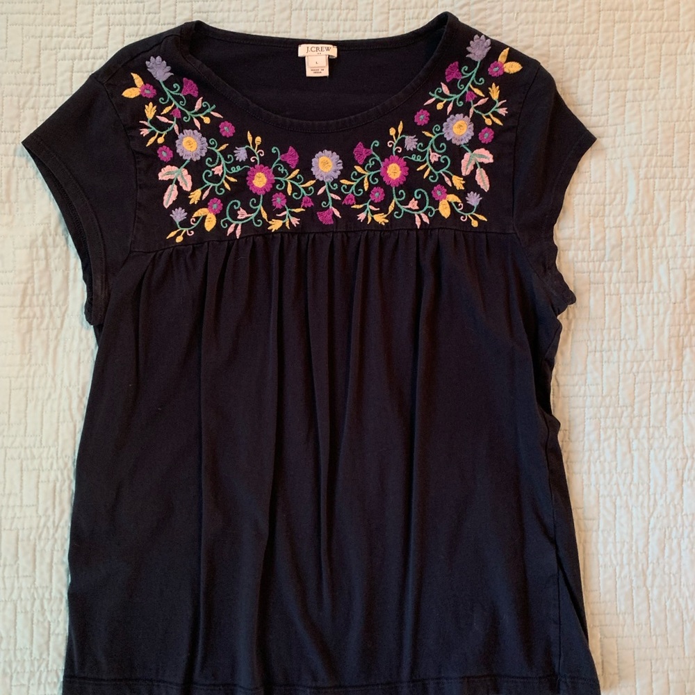 Embroidered navy tee.